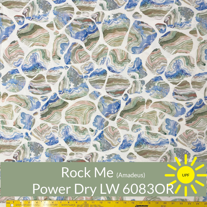 Random sized rounded blue olive rust shade pebbles on white polartec power dry lightweight #color_6083or-rock-me