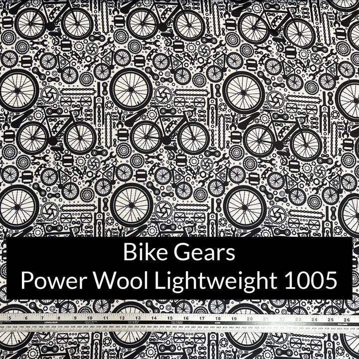 Off White with Black Bicycles and bike parts print Polartec Power Wool Lightweight 1005 Fabric Swatch