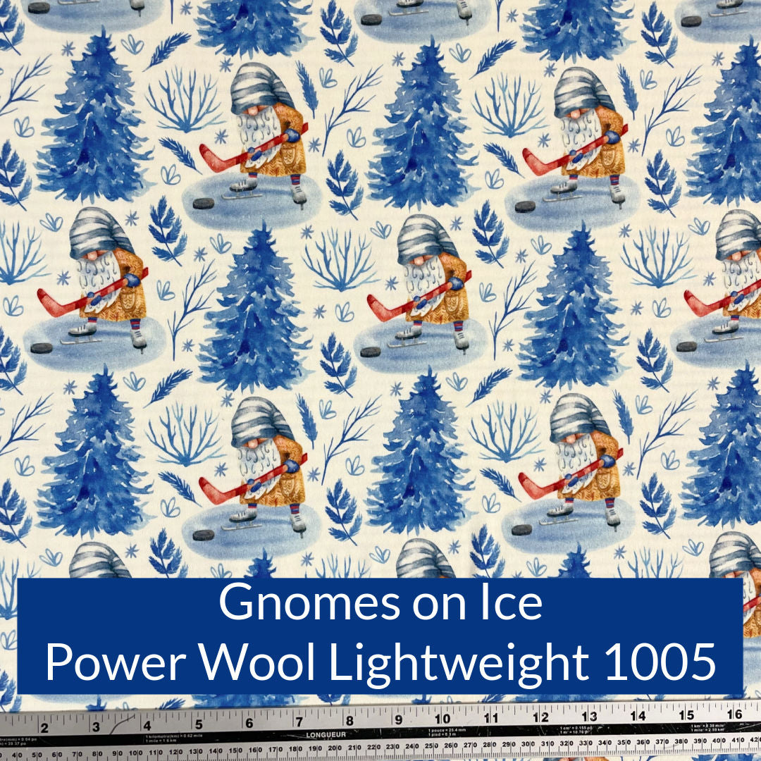 Cute Gnomes on Ice with hockey sticks off white background with royal blue trees Polartec Power Wool Lightweight 1005 Fabric Swatch