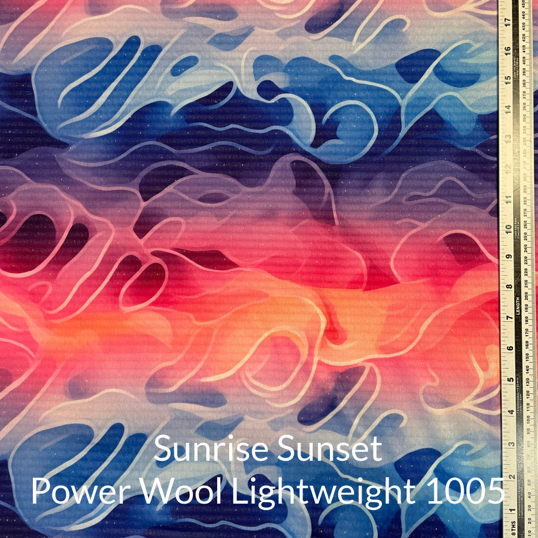 Ombre Effect of purple to royal blue to orange to pink light a sunset Polartec Power Wool Lightweight 1005 Fabric Swatch