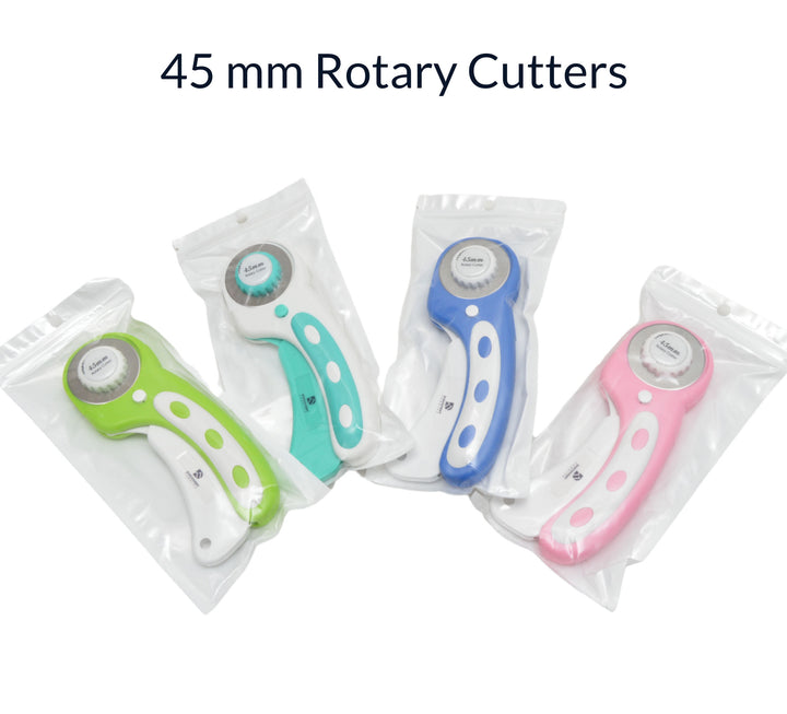 Image of lime green aqua blue and pink  45 mm rotary cutters