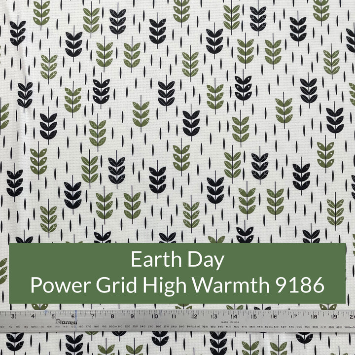 print on off white polartec power grid of simple leaves in shades of black and olive green