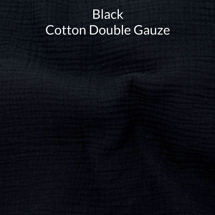 Black cotton double gauze fabric with text overlay