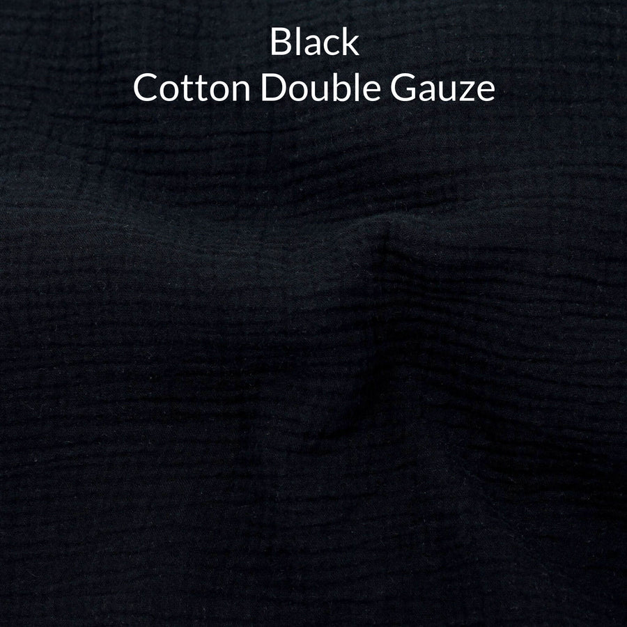 Black cotton double gauze fabric with text overlay
