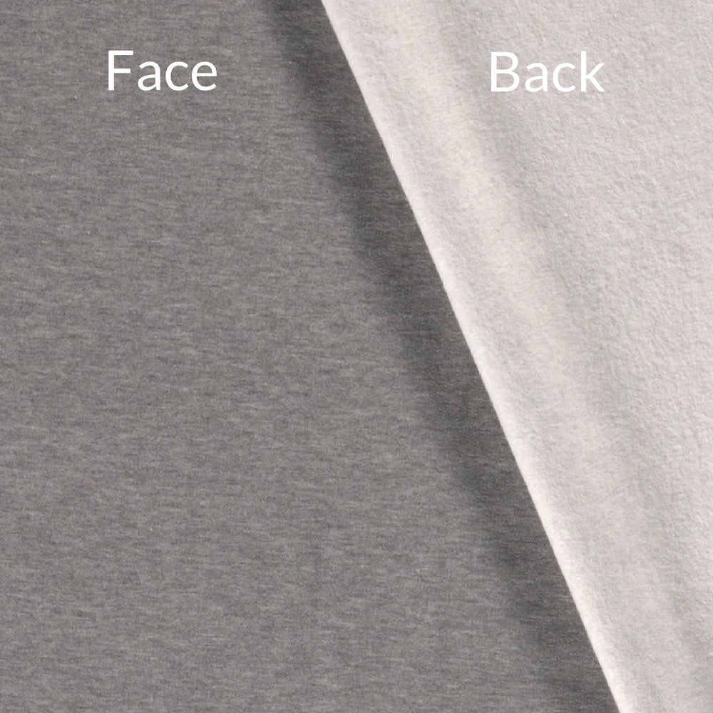 Light grey heavyweight jogging fleece fabric swatch showing right side and wrong side of fabric