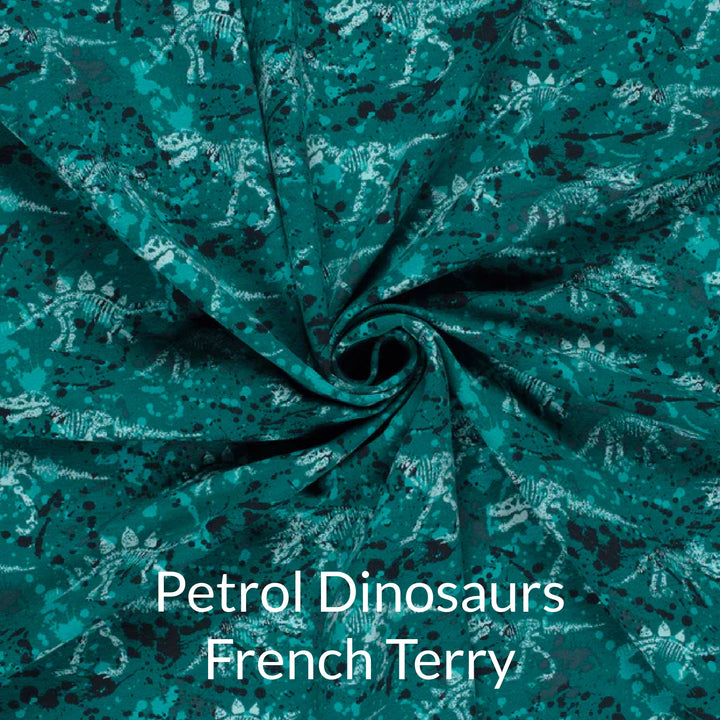 French terry fabric swatch of dinosaur skeleton print in shades of petrol teal