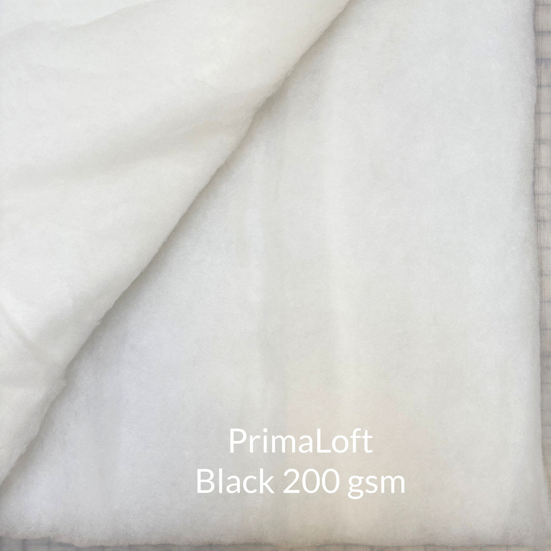 Close-up of White PrimaLoft Black Style 200 gsm insulation material