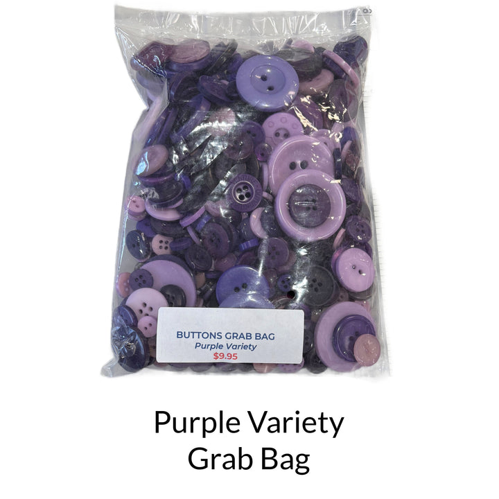Mixed bag of purple buttons in different sizes and shades