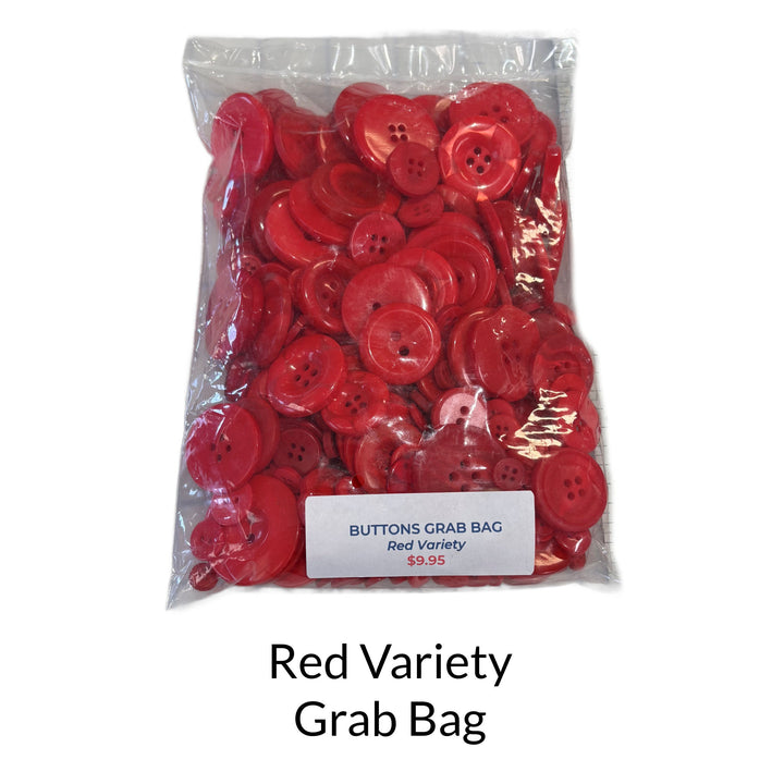 Mixed bag of red buttons in different sizes and shades