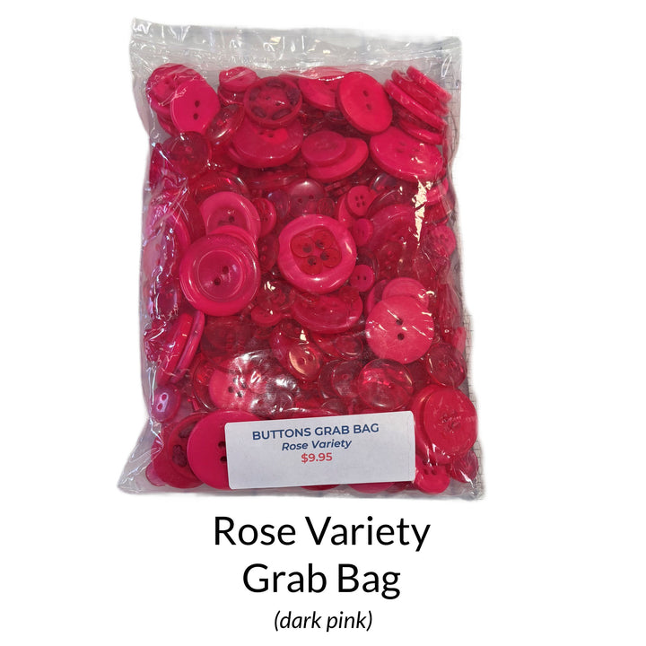 Bag of dark pink buttons labeled 'Rose Variety Grab Bag' on a white background