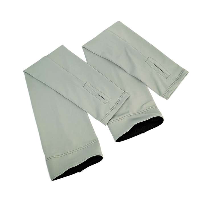 One pair of sun sleeves lying on a white background