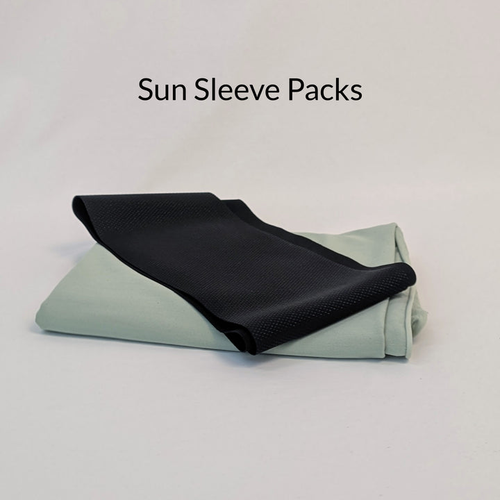 One piece of folded Silicon Grip Athletic and one piece of folded Sun Lite Jersey with text stating Sun Sleeve Packs