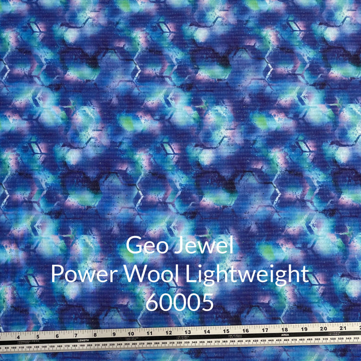 shades of blue purple and green with faint honeycomb pattern lightweight polartec power wool fabric