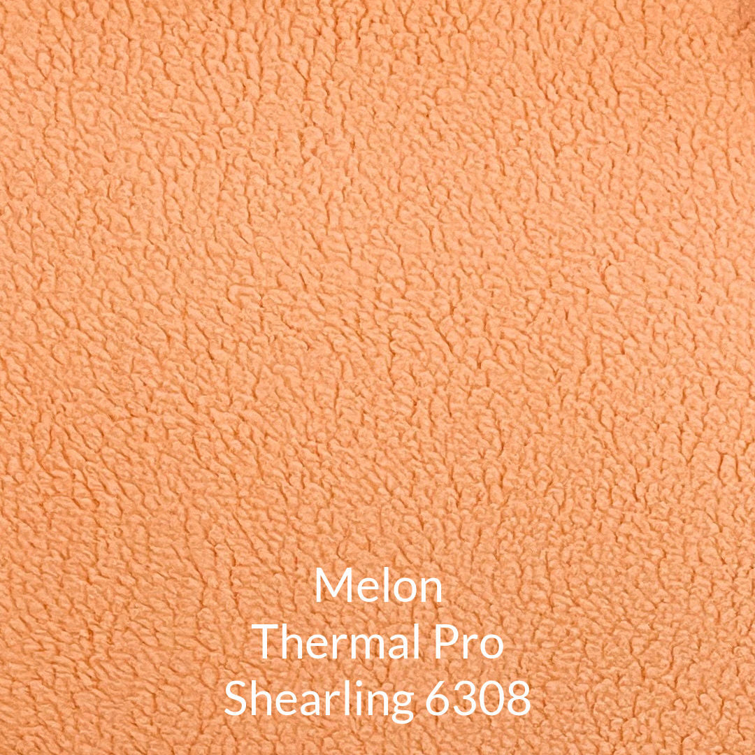 cantaloupe melon coloured shearling polartec fleece fabric