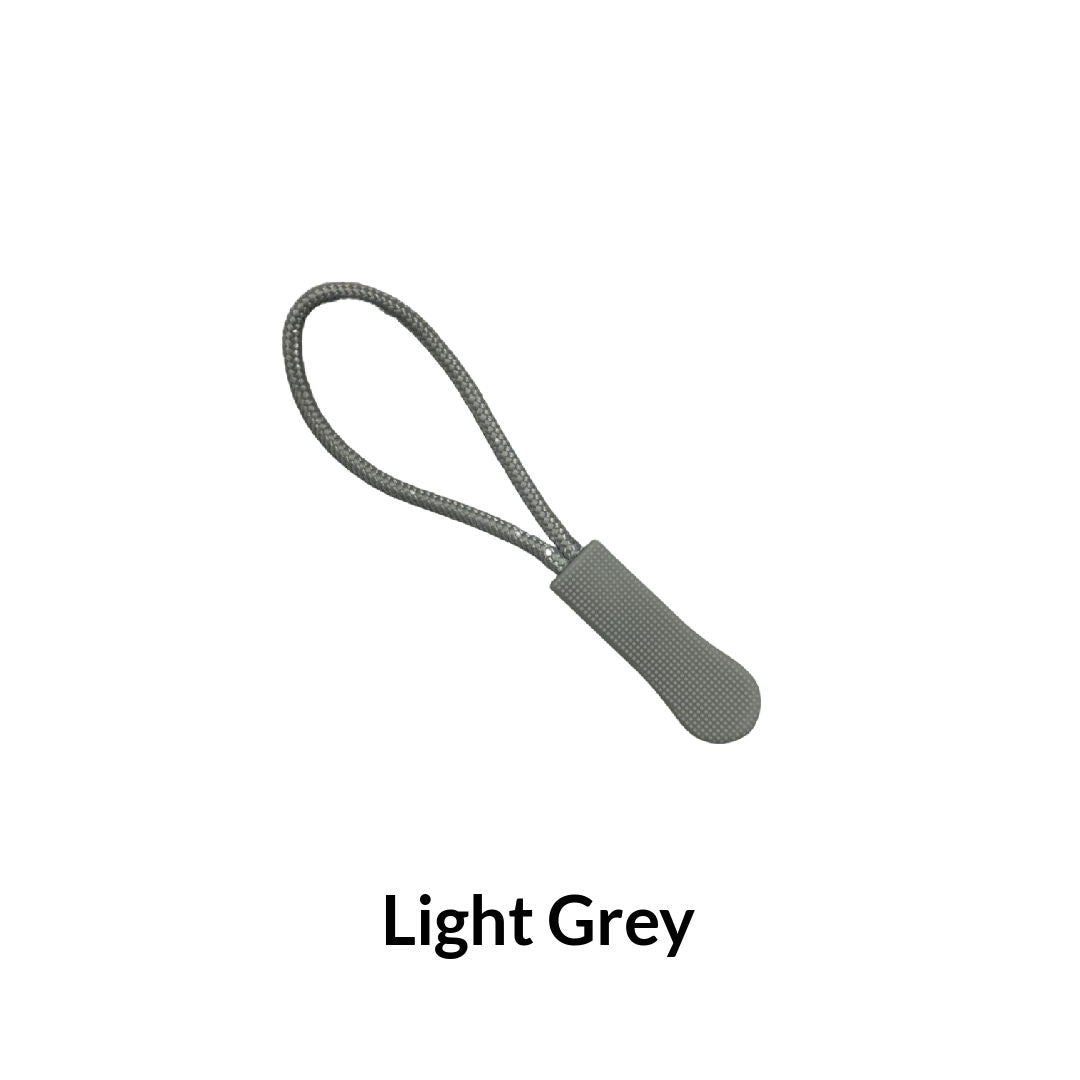 Light grey textured zipper pull with attached cord